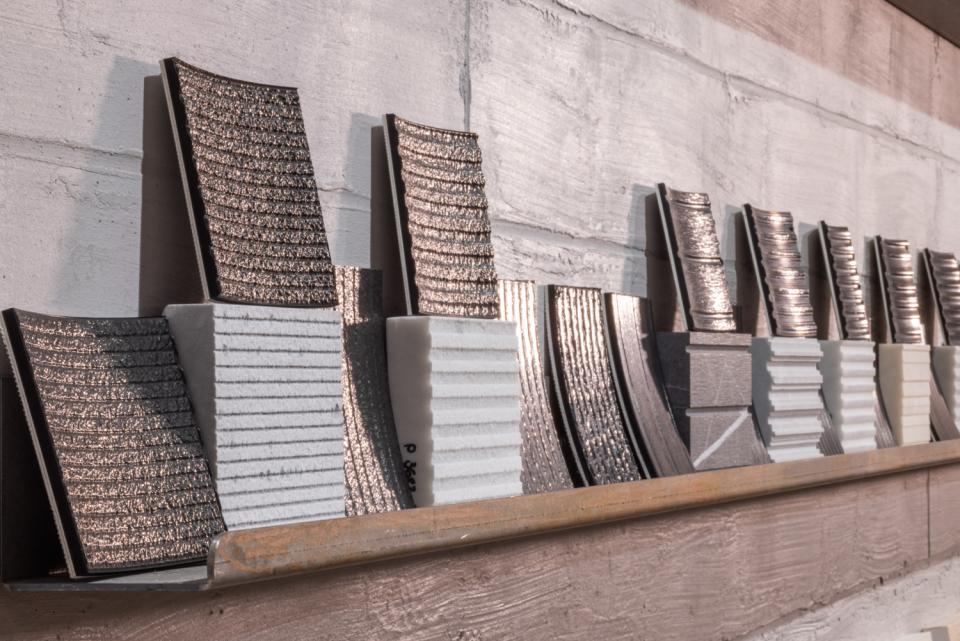Engraved top belts